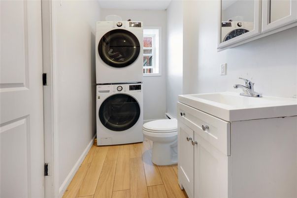 Bathroom, Interior, Utility Closets, Washer, Wood Texture Flooring