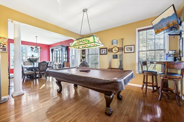Billiard Table, Chandelier, Dining room, Game Room, Interior, Pendant Lights, Wood Texture Flooring
