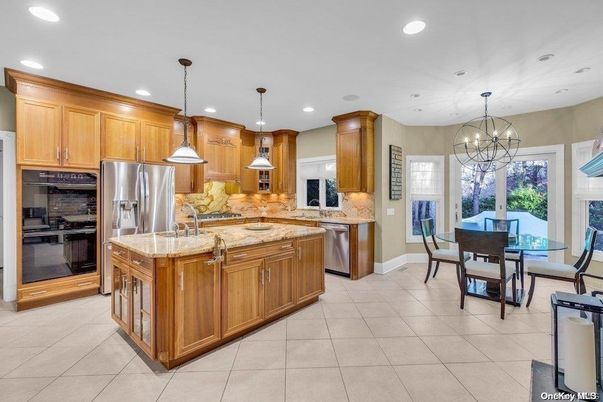 Chandelier, Dining room, Interior, Kitchen, Pendant Lights, Recessed Lighting, Stainless Steel Appliances