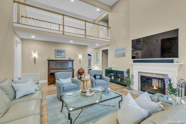 Fireplace, Interior, Living room, Piano, Recessed Lighting, Wood Texture Flooring