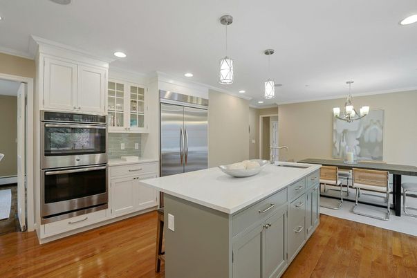 Chandelier, Dining room, Interior, Kitchen, Pendant Lights, Recessed Lighting, Stainless Steel Appliances, Wood Texture Flooring