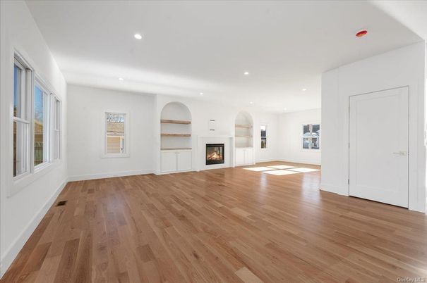 Empty room, Fireplace, Interior, Recessed Lighting, Wood Texture Flooring