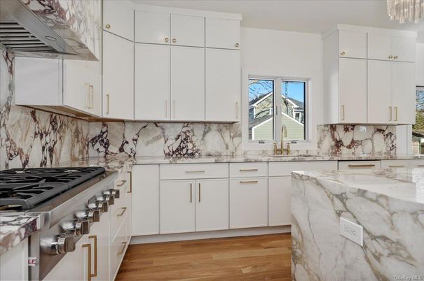 Interior, Kitchen, Marble Walls, Stainless Steel Appliances, Wood Texture Flooring