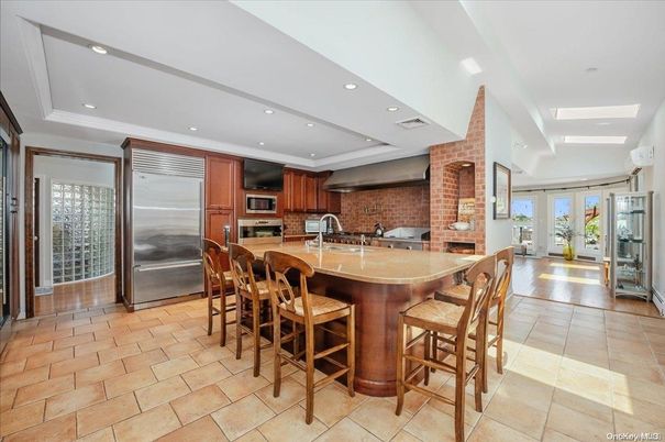 Interior, Kitchen, Recessed Lighting, Stainless Steel Appliances, Stone Walls
