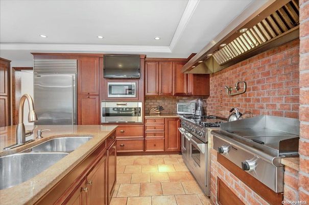 Interior, Kitchen, Recessed Lighting, Stainless Steel Appliances, Stone Walls