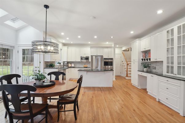 Dining room, Interior, Kitchen, Pendant Lights, Recessed Lighting, Stainless Steel Appliances, Wood Texture Flooring