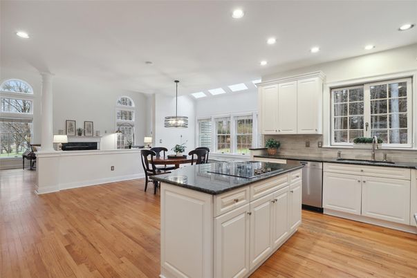 Dining room, Interior, Kitchen, Pendant Lights, Recessed Lighting, Stainless Steel Appliances, Wood Texture Flooring