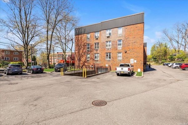 Exterior, Facade, Brick Facade, Condo Building