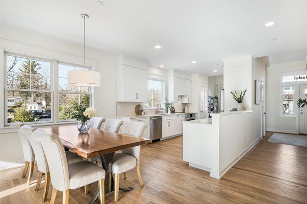 Dining room, Interior, Kitchen, Pendant Lights, Recessed Lighting, Stainless Steel Appliances, Wood Texture Flooring