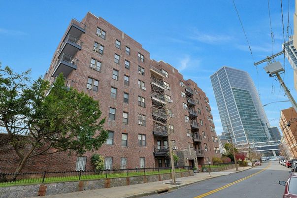 Exterior, Facade, Brick Facade, Condo Building