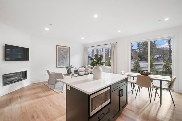 Dining room, Fireplace, Interior, Kitchen, Recessed Lighting, Wood Texture Flooring