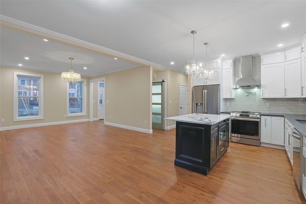 Chandelier, Interior, Kitchen, Pendant Lights, Recessed Lighting, Stainless Steel Appliances, Wood Texture Flooring