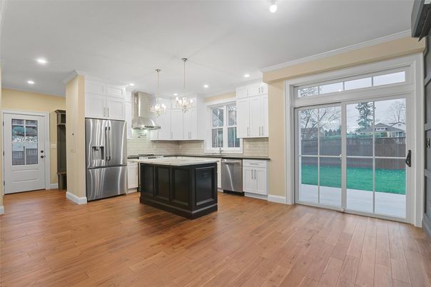 Chandelier, Interior, Kitchen, Pendant Lights, Recessed Lighting, Stainless Steel Appliances, Wood Texture Flooring