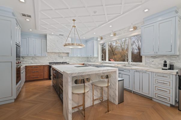 Interior, Kitchen, Marble Walls, Pendant Lights, Recessed Lighting, Stainless Steel Appliances, Wood Texture Flooring
