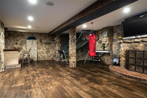 Fireplace, Interior, Recessed Lighting, Stone Walls, Wood Texture Flooring