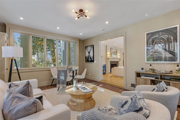 Dining room, Fireplace, Interior, Living room, Recessed Lighting, Wood Texture Flooring