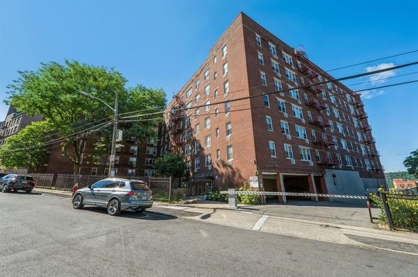 Exterior, Facade, Brick Facade, Condo Building