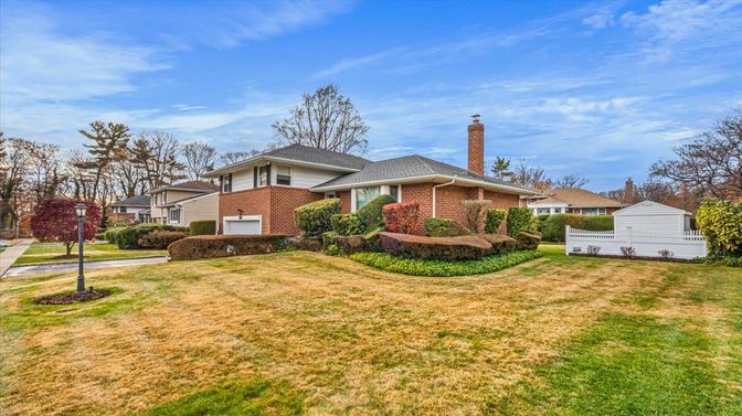 Attached, Backyard, Exterior, Facade, Brick Facade, Split Level