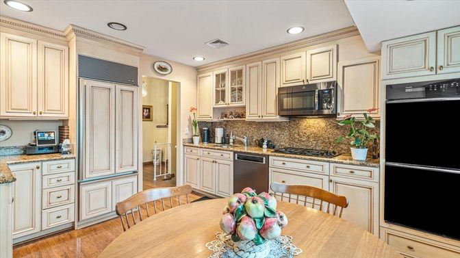 Dining room, Interior, Kitchen, Recessed Lighting, Stainless Steel Appliances, Wood Texture Flooring
