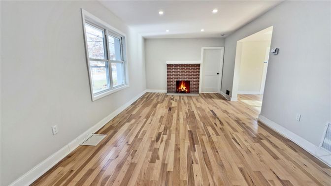 Empty room, Fireplace, Interior, Recessed Lighting, Wood Texture Flooring