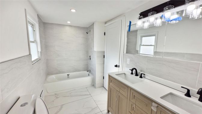 Bathroom, Dual Sink Vanities, Interior, Marble, Marble Walls, Recessed Lighting