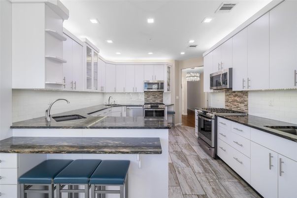 Interior, Kitchen, Recessed Lighting, Stainless Steel Appliances, Wood Texture Flooring