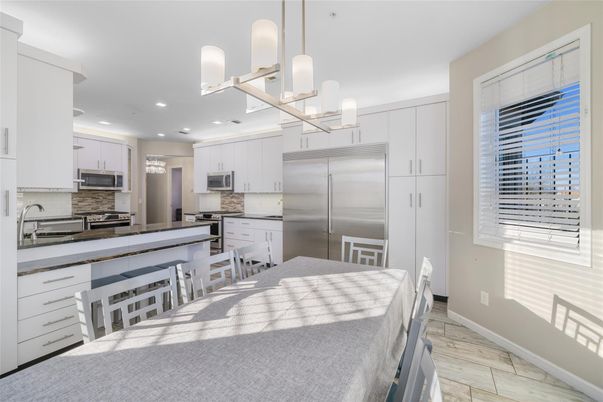 Interior, Kitchen, Pendant Lights, Recessed Lighting, Stainless Steel Appliances, Wood Texture Flooring