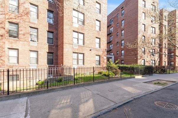 Exterior, Facade, Brick Facade, Condo Building