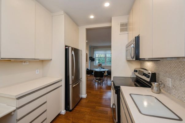 Dining room, Interior, Kitchen, Recessed Lighting, Stainless Steel Appliances, Wood Texture Flooring