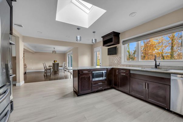 Dining room, Interior, Kitchen, Pendant Lights, Recessed Lighting, Stainless Steel Appliances, Wood Texture Flooring