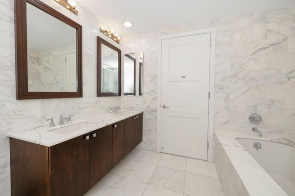 Bathroom, Dual Sink Vanities, Interior, Marble, Marble Walls, Recessed Lighting
