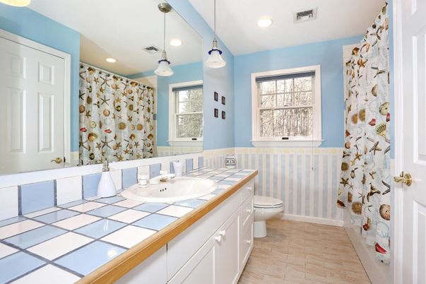 Bathroom, Interior, Pendant Lights, Recessed Lighting, Tile Countertops, Wood Texture Flooring