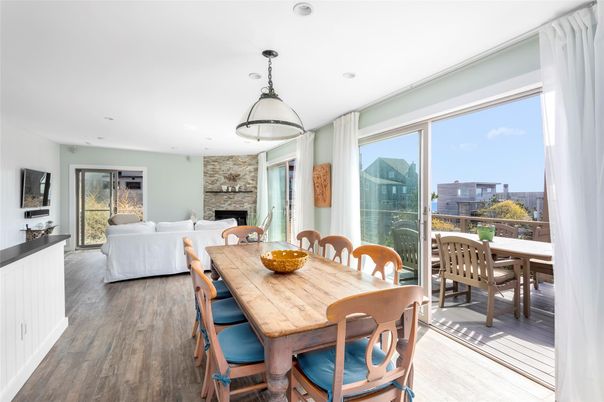 Dining room, Fireplace, Interior, Living room, Pendant Lights, Recessed Lighting, Stone Walls, Wood Texture Flooring