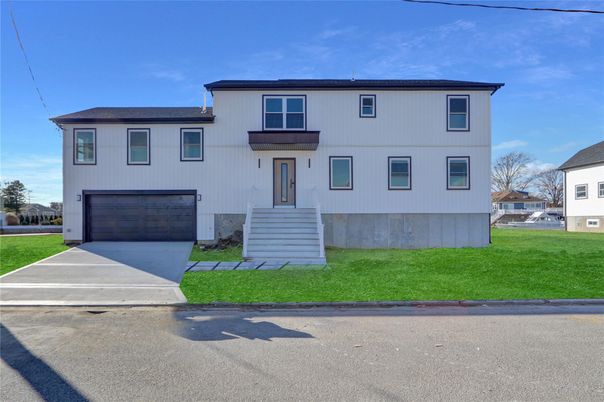 Attached, Exterior, Facade, Raised Ranch