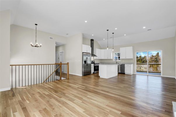Chandelier, Interior, Kitchen, Pendant Lights, Recessed Lighting, Stainless Steel Appliances, Wood Texture Flooring
