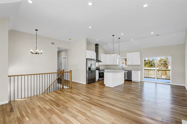 Chandelier, Interior, Kitchen, Pendant Lights, Recessed Lighting, Stainless Steel Appliances, Wood Texture Flooring