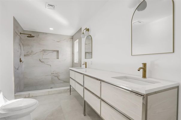 Bathroom, Dual Sink Vanities, Glass Shower, Interior, Marble Walls, Recessed Lighting