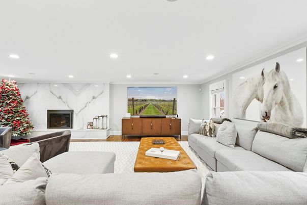 Fireplace, Interior, Living room, Marble Walls, Recessed Lighting, Wood Texture Flooring