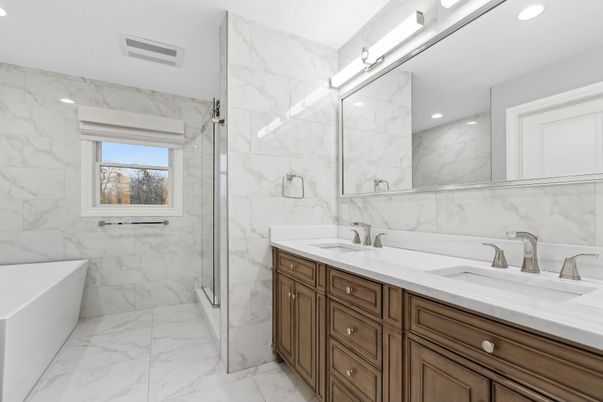 Bathroom, Dual Sink Vanities, Glass Shower, Interior, Marble, Marble Walls, Recessed Lighting