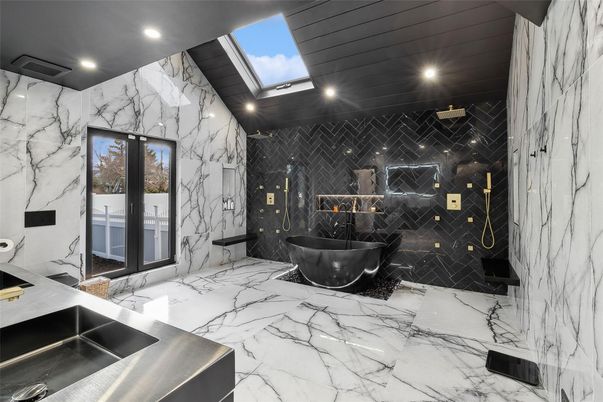 Bathroom, Dual Sink Vanities, Free Standing Baths, Glass Shower, Interior, Marble, Marble Walls, Recessed Lighting