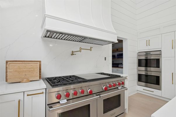 Interior, Kitchen, Marble Walls, Stainless Steel Appliances, Wood Texture Flooring