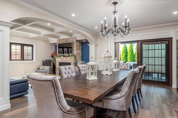 Chandelier, Dining room, Fireplace, Interior, Recessed Lighting, Wood Texture Flooring