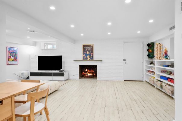 Fireplace, Interior, Recessed Lighting, Stone Walls, Wood Texture Flooring