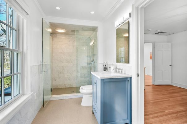Bathroom, Glass Shower, Interior, Marble Walls, Recessed Lighting, Wood Texture Flooring
