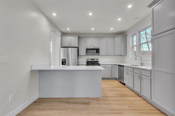 Interior, Kitchen, Recessed Lighting, Stainless Steel Appliances, Wood Texture Flooring