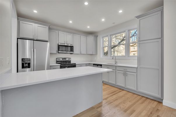 Interior, Kitchen, Recessed Lighting, Stainless Steel Appliances, Wood Texture Flooring