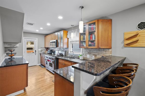 Interior, Kitchen, Pendant Lights, Recessed Lighting, Stainless Steel Appliances, Wood Texture Flooring