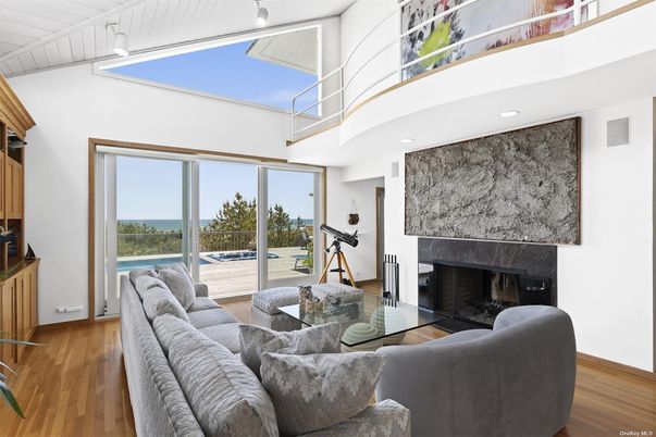 Fireplace, Interior, Living room, Recessed Lighting, Water, Wood Texture Flooring