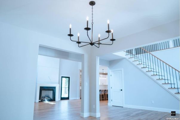 Chandelier, Empty room, Fireplace, Interior, Pendant Lights, Wood Texture Flooring