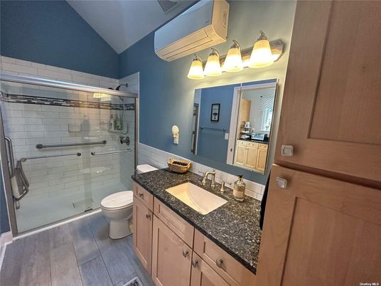 Bathroom, Dual Sink Vanities, Glass Shower, Interior, Wood Texture Flooring